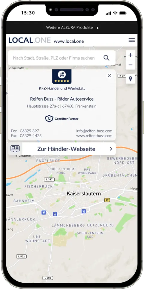 Un smartphone affiche la carte de visite numérique d'un détaillant vérifié, avec les coordonnées importantes telles que l'adresse, les numéros de téléphone et de télécopie et l'adresse électronique. Des informations sur le secteur d'activité du détaillant et un lien vers son site web sont également visibles.